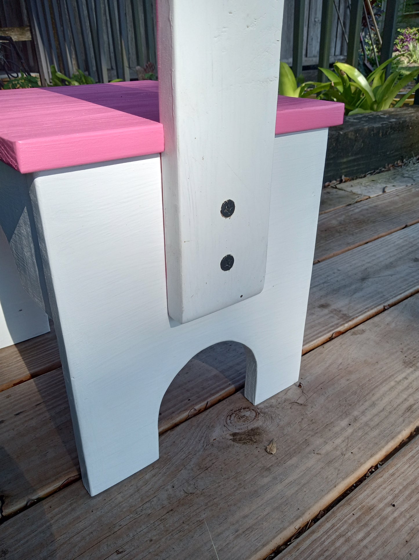 A close-up picture of the bolts holding the handle in place on the Sturdy step stool.