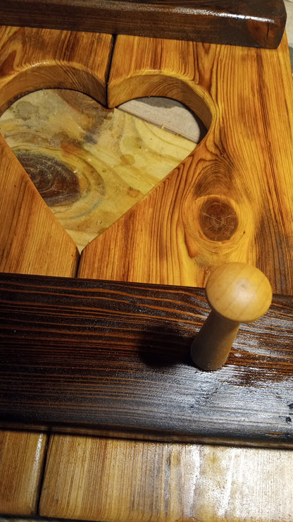 Cypress Wall Decor Coat Rack featuring a heart-shaped cutout, turned wooden knob, and visible wood grain, offering a cozy, sturdy design for coat hanging.