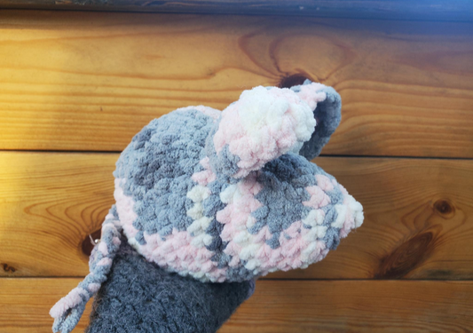 Crochet pink and grey mouse side view