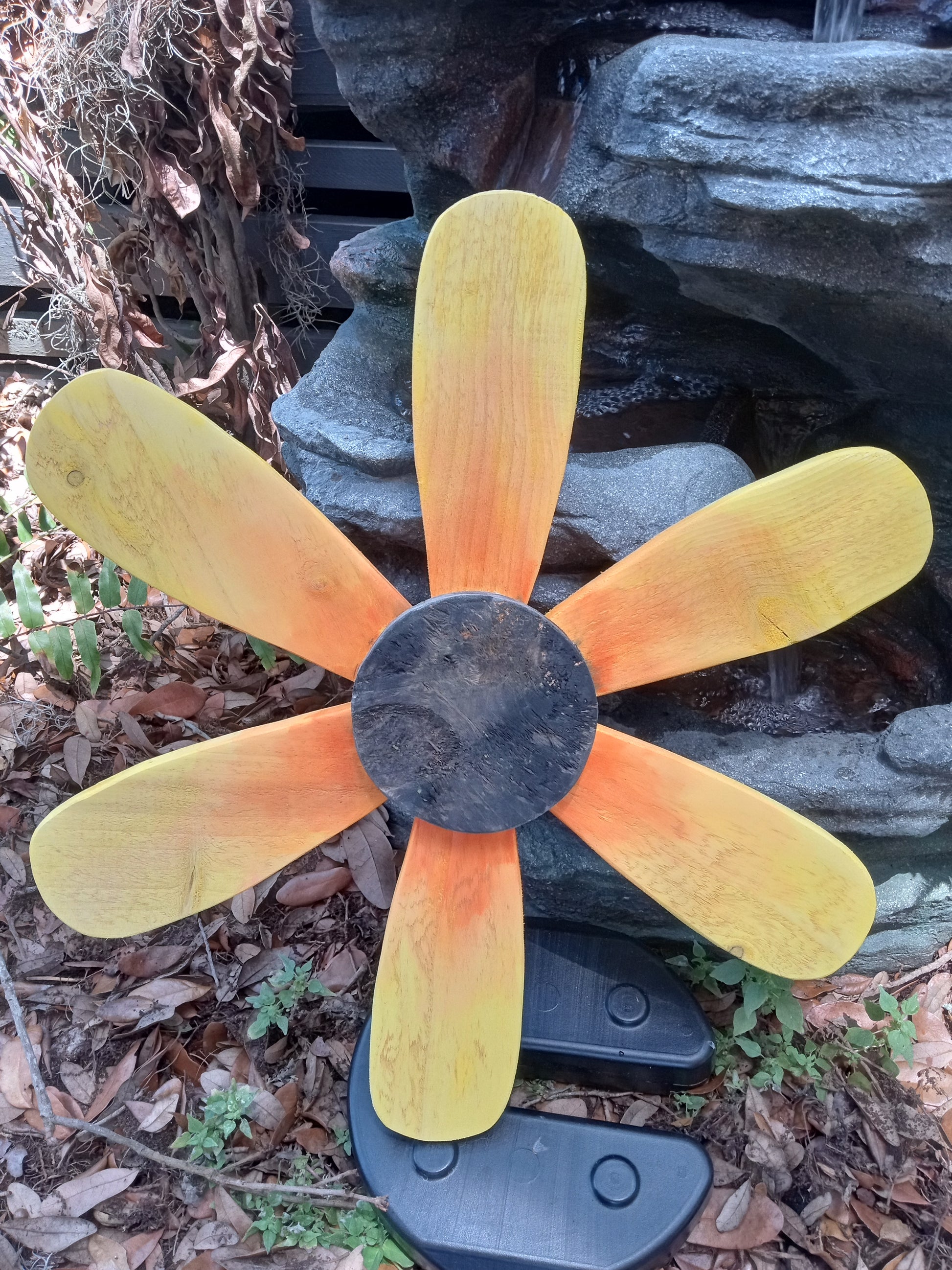 Large wooden sunflower wall art showing 20-inch diameter scale.