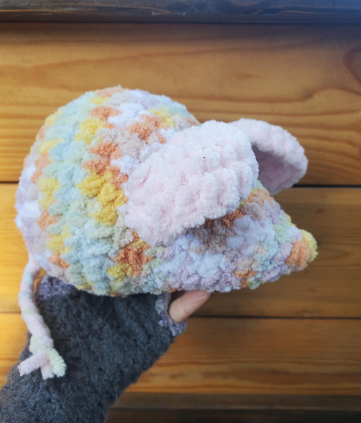 Pastel crochet mouse side view